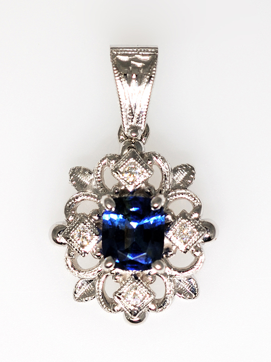 14K gold pendant with sapphire and diamond, est. $500-$550. Image courtesy Morton Kuehnert Auctioneers.